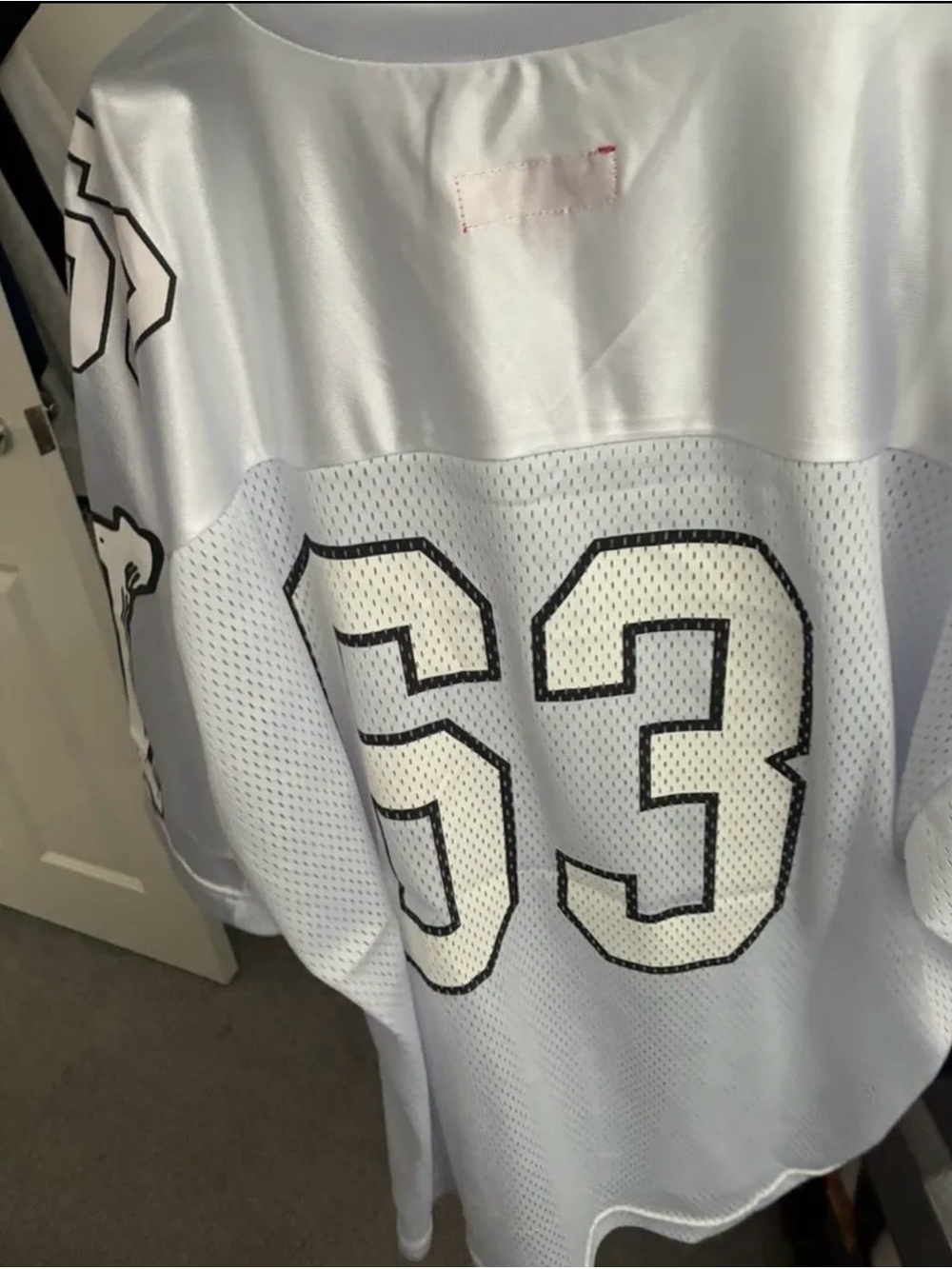 Supreme White Jersey with Black-Trimmed Number 63